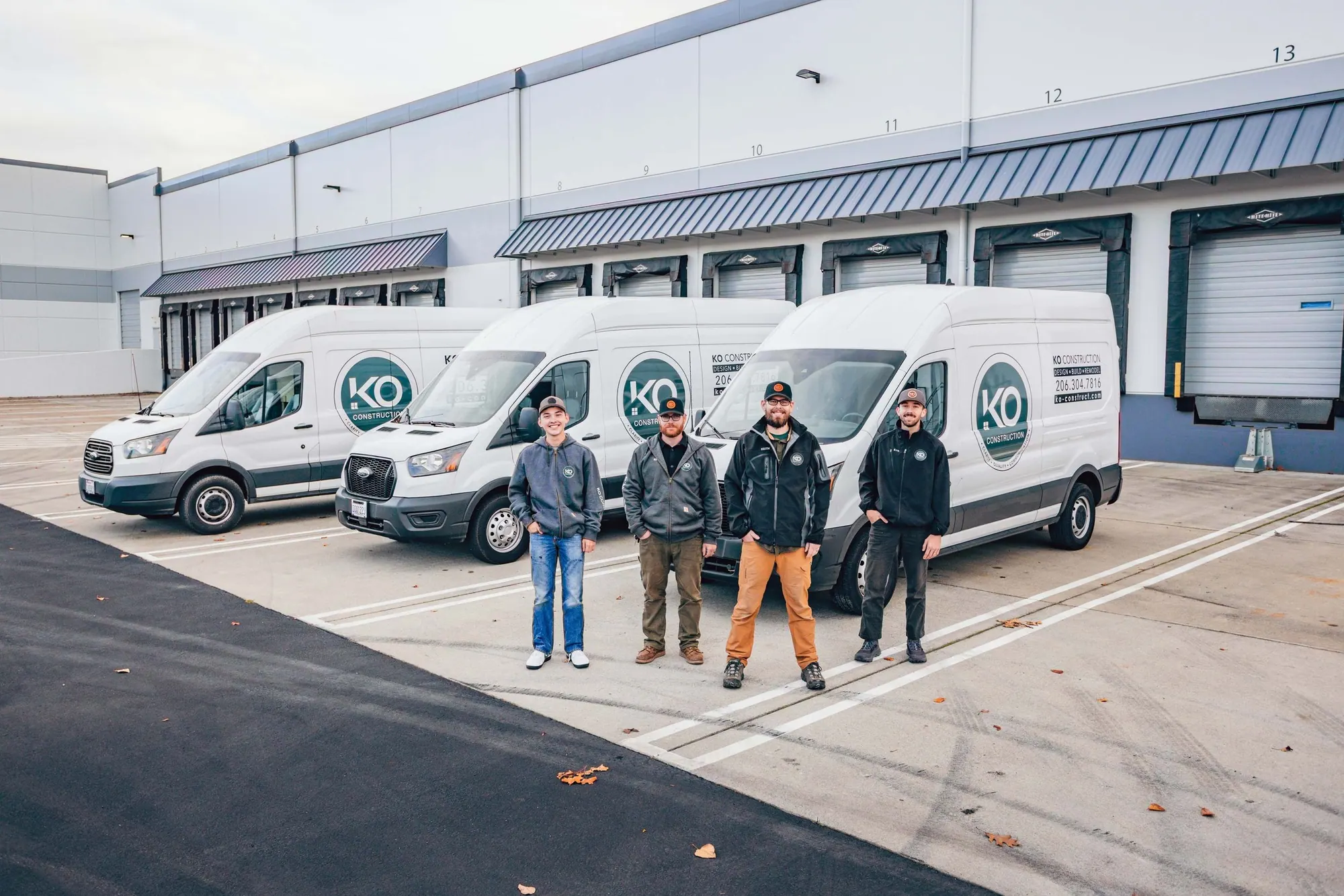 The KO Construction team with their vans